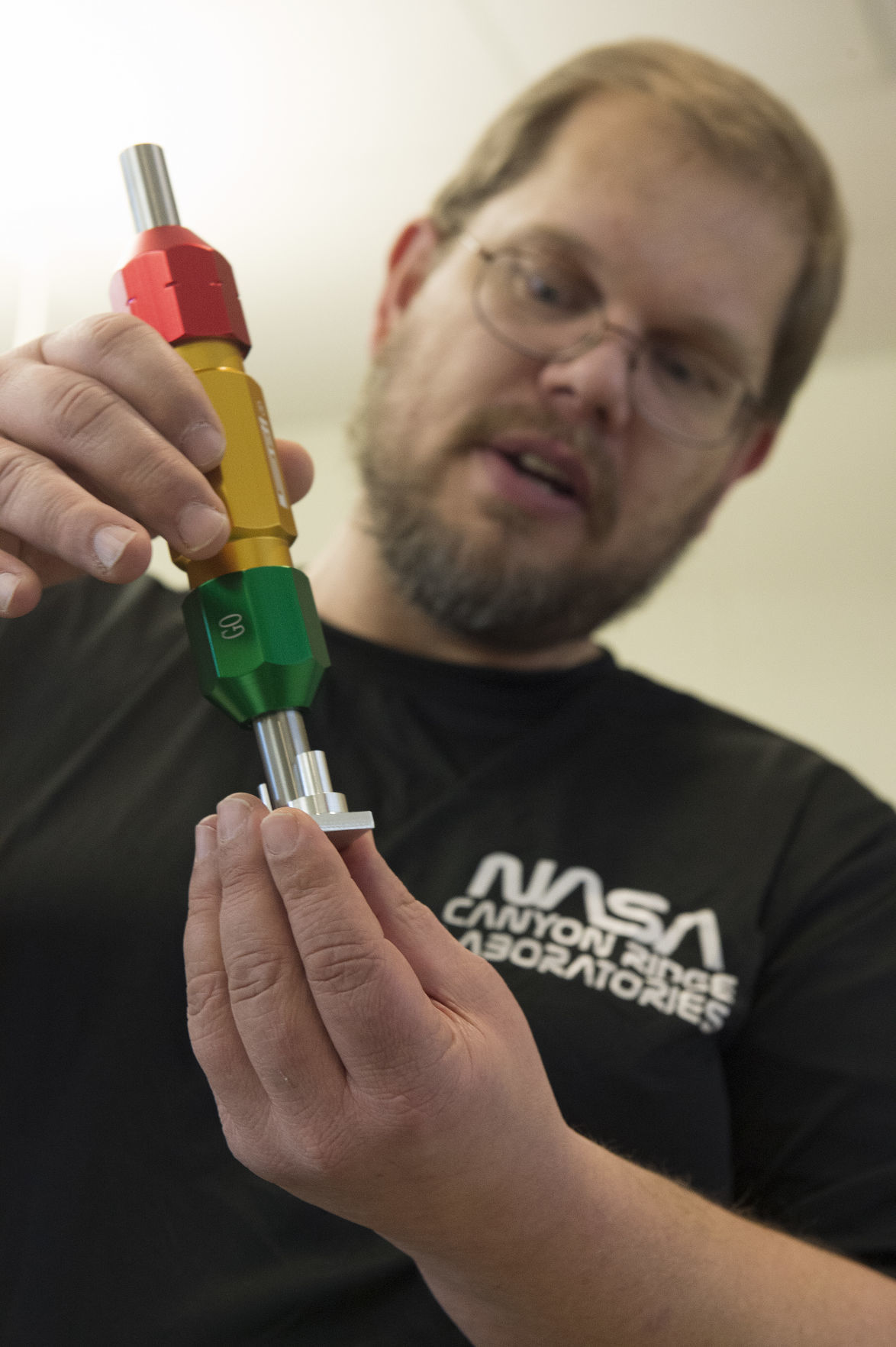 High schoolers making spaceship parts